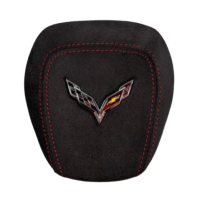 2014–2019 Chevrolet Corvette C7 custom black Alcantara airbag cover with red double-row contrast stitching and a Corvette crossed-flags emblem.