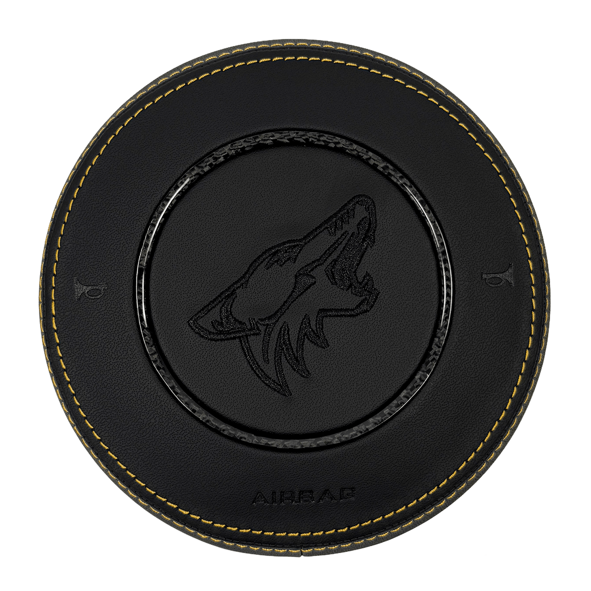 2015–2023 Ford Mustang S550 custom black leather airbag cover with yellow contrast stitching, woven carbon fiber trim ring, and black howling Coyote logo.