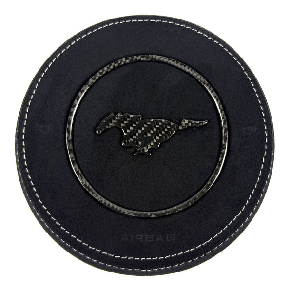 2015-2023 Ford Mustang S550 custom black Alcantara airbag cover with white stitching, carbon fiber trim ring, and carbon fiber pony emblem