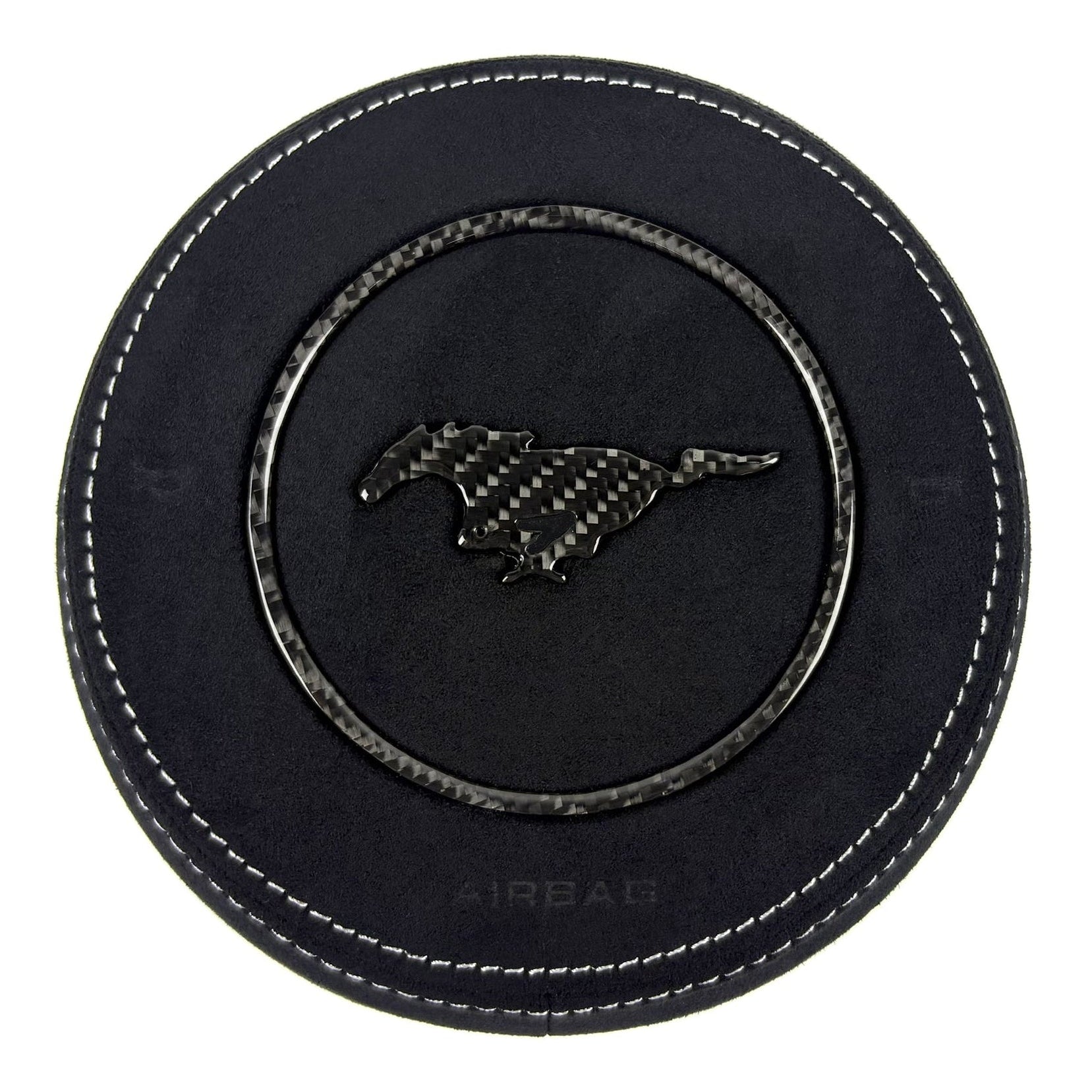 2015-2023 Ford Mustang S550 custom black Alcantara airbag cover with white stitching, carbon fiber trim ring, and carbon fiber pony emblem