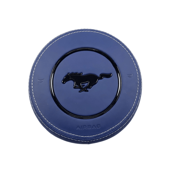 2015-2023 Ford Mustang S550 custom blue leather airbag cover with white stitching, black pony emblem, and gloss black trim ring