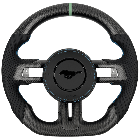 2015–2023 Ford Mustang S550 custom carbon fiber steering wheel by Texas Carbon with matte woven carbon fiber, black perforated leather grips, blue stitching, a green center stripe, and a flat-bottom design.