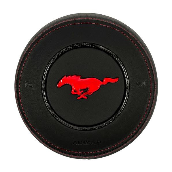 2015–2023 Ford Mustang S550 custom RGB LED airbag cover in black leather with red stitching, a carbon fiber trim ring, and an illuminated red pony emblem.