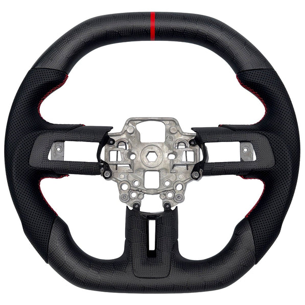 2015–2023 Ford Mustang S550 matte carbon fiber steering wheel by Texas Carbon with black perforated leather grips, red stitching, a red center stripe, and a flat-bottom design.