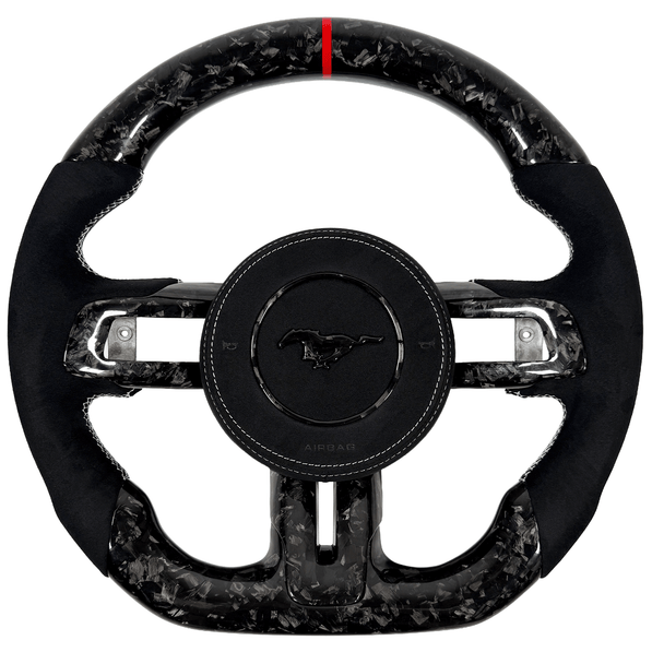 2018–2023 Ford Mustang S550 forged carbon fiber flat-bottom steering wheel with black Alcantara grips and red center stripe.
