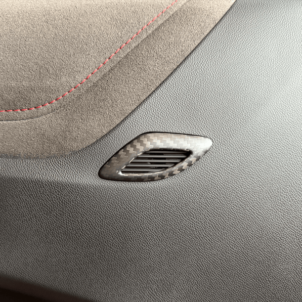 2016-2024 Camaro carbon fiber door air outlet trim installed on interior door panel