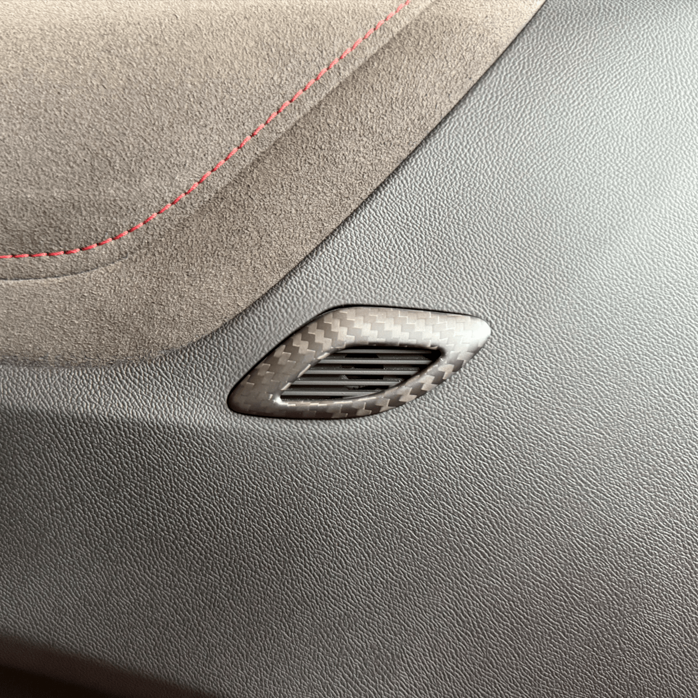 2016-2024 Camaro carbon fiber door air outlet trim installed on interior door panel