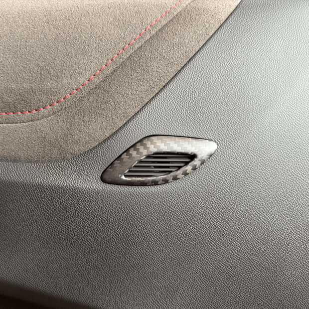 2016-2024 Camaro carbon fiber door air outlet trim installed on interior door panel