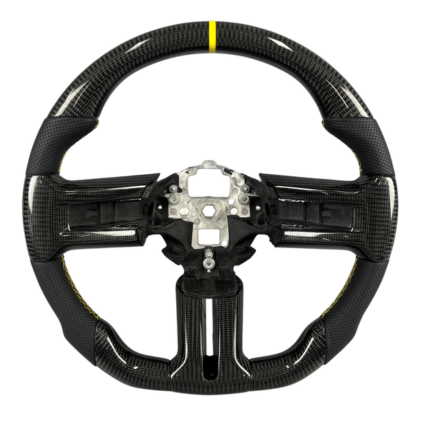 2010-2014 S197 Mustang carbon fiber steering wheel with black perforated leather grips and yellow center stripe