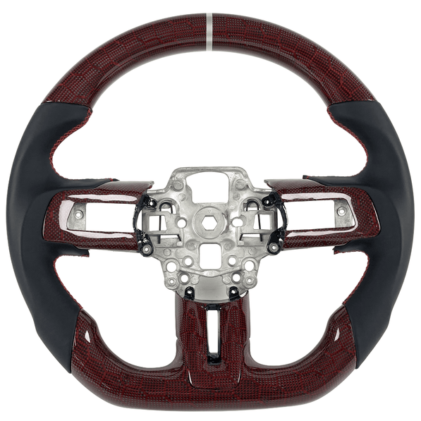 2015-2023 Ford Mustang S550 red honeycomb carbon fiber custom steering wheel with black leather grips, red stitching, and silver 12 o'clock center stripe